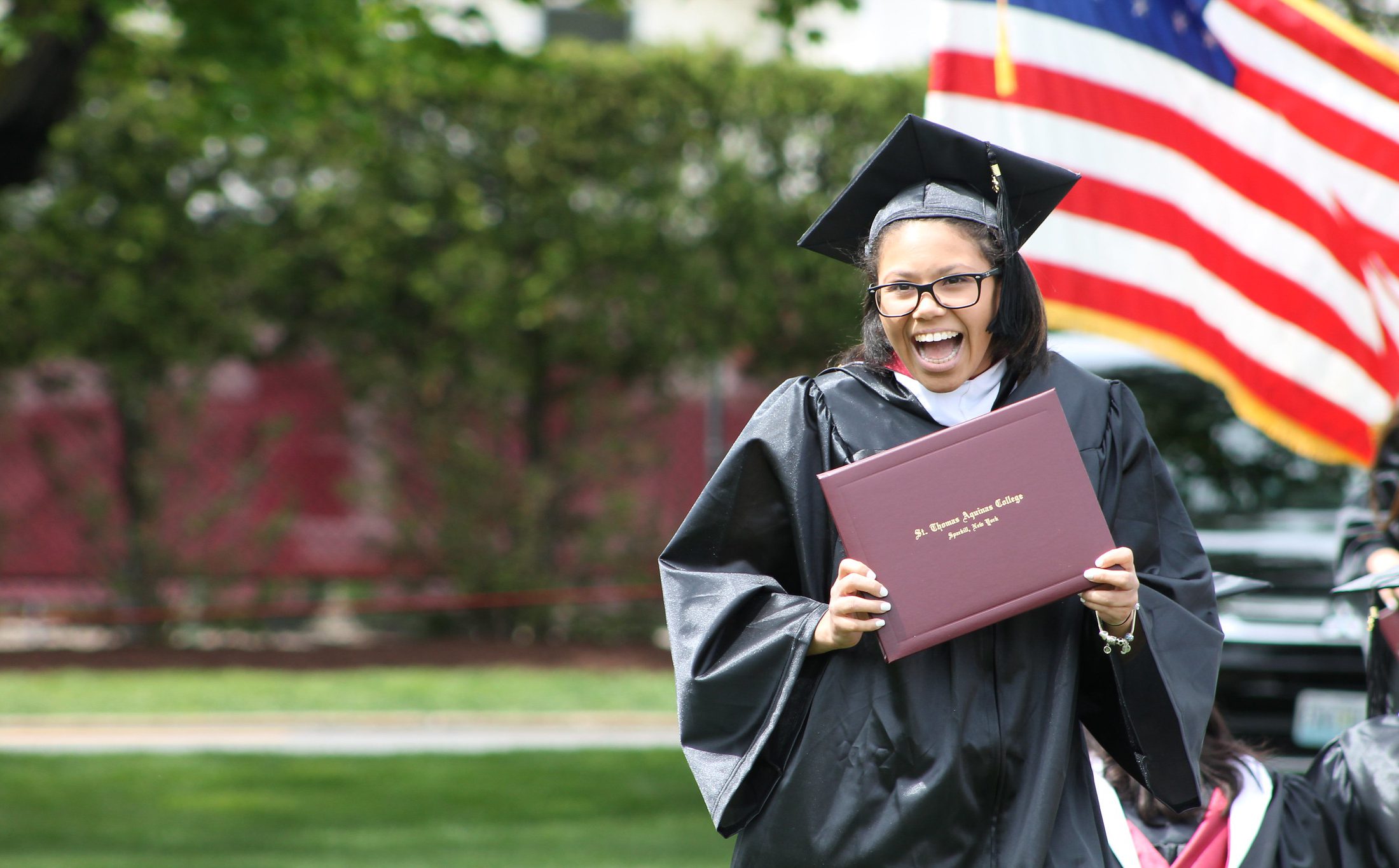 graduate at commencement