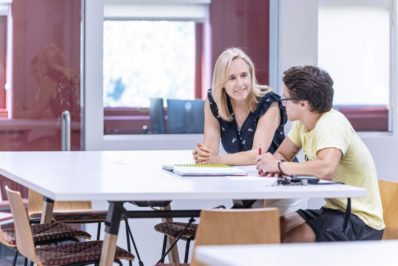 Student Development Advisor in Career Center with male student
