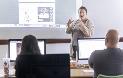 Professor teaching design in class.