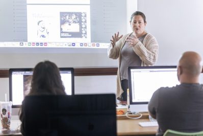 Professor teaching design in class.