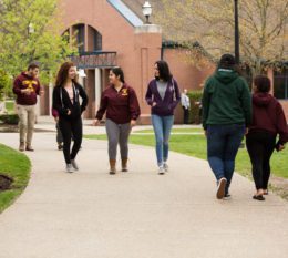 students walking on McNelis Commons