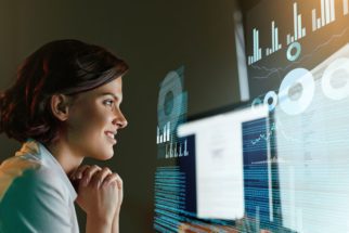 Data scientist looking at computer