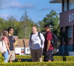 St. Thomas Aquinas College Students Outside Chatting near Costello Hall