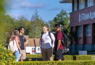 St. Thomas Aquinas College Students Outside Chatting near Costello Hall