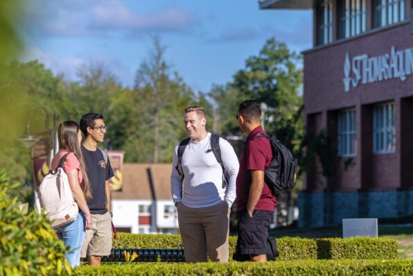 St. Thomas Aquinas College Students Outside Chatting near Costello Hall