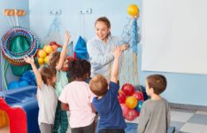 Gym teacher in class with students