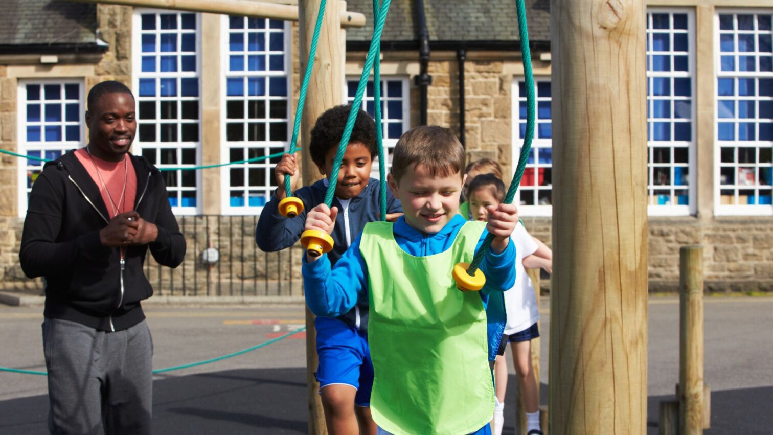 Gym teacher in class with students