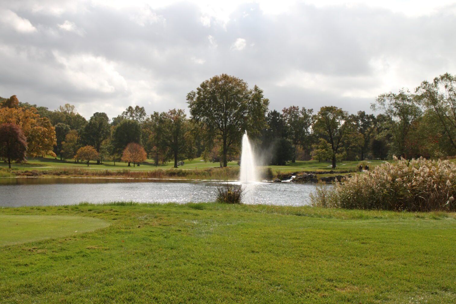 Fountain in a pond on a golf course