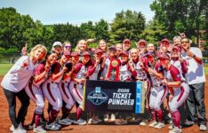 Women's Softball team with trophy